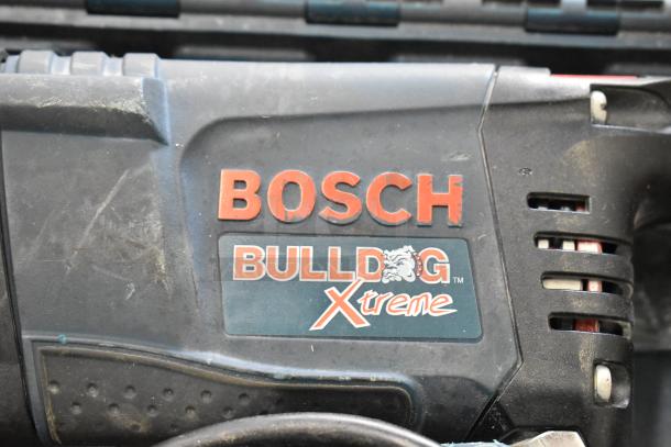 Bosch 11255VSR Bulldog Xtreme Rotary Hammer with visible label, showcasing used condition. Part of a 7-item tool set auction.