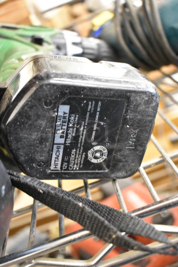 Hitachi 12V battery pack, showing labels with caution and model details, resting on a metal wire shelf. Suitable for Hitachi tools.