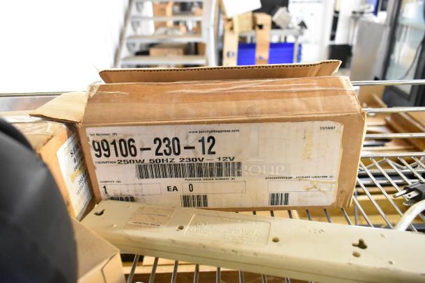 Box with label "99106-230-12", 250W, 50Hz, 230V, 12V on shelving. Includes Winplus Power Station. 9 items total.