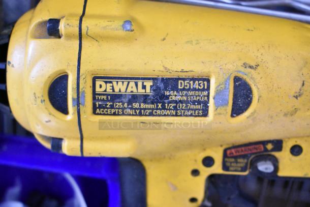 DeWalt D51431 crown stapler, type 1, accepts 1/2" staples, shown in used condition with visible labels and markings.