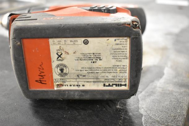 DeWalt and Hilti power tools including reciprocating saw, crown stapler, and sander. Hilti label shows model TE4-A18.