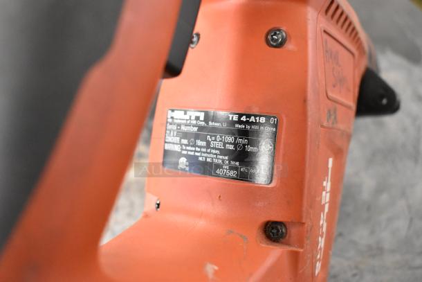 Hilti TE 4-A18 tool with visible label showing model and specifications, part of an 8-item auction set including DeWalt and Bosch tools.