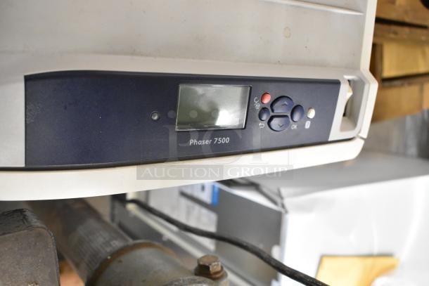 Two Xerox Phaser 7500 printers, shown in good condition, front panel with model label visible.