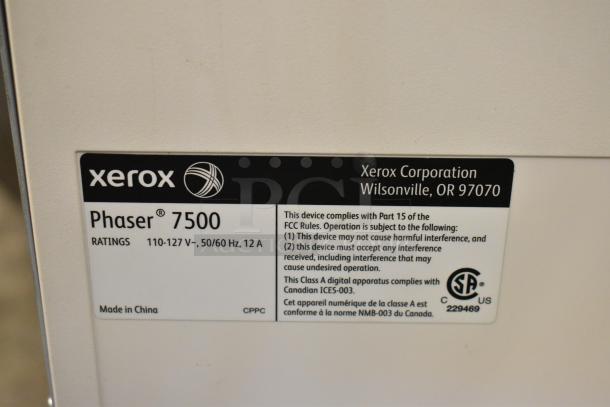 Label on Xerox Phaser 7500 printer; details model, voltage ratings, and FCC compliance; made in China.