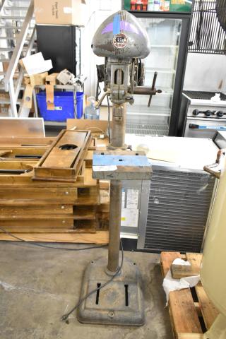 Vintage Delta/Milwaukee drill press, 120V, 1 phase, worn condition, with original label.