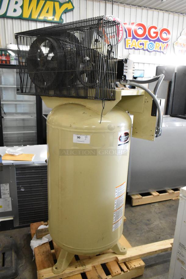 Ingersoll Rand 2475N5-V commercial air compressor, metal body, moderate wear, labels intact, on wooden pallet.