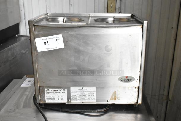 Crathco D25-3 stainless steel beverage machine, 2 hoppers, countertop model, 115 volts, commercial use, visible wear.