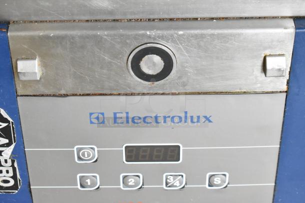 Electrolux HSPPAN metal commercial countertop panini press, 208V, 1 phase, visible wear, digital display, control buttons.