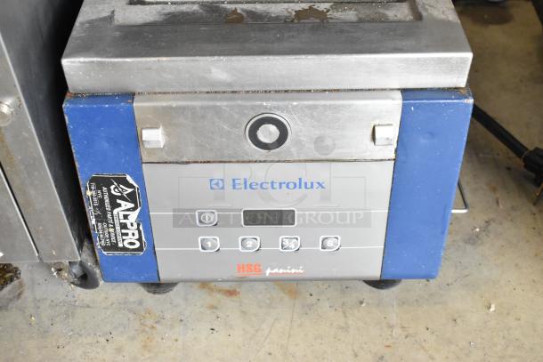 Electrolux HSPPAN commercial countertop panini press, metal construction, 208V, 1 phase, visible controls and branding.