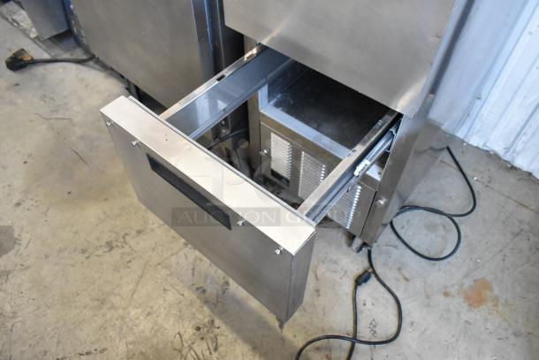Silver King SKSD/C4 stainless steel commercial cooler with 2 drawers, on casters. 115 Volts, 1 Phase; durable condition.