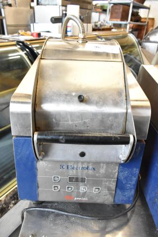 Electrolux HSPPAN metal commercial countertop panini press, 208 volts, 1 phase, used condition, visible control panel.
