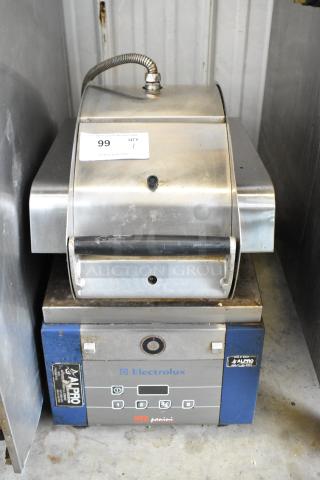 Electrolux HSPPAN metal commercial countertop panini press, 208 volts, 1 phase, visible wear, Electrolux branding.