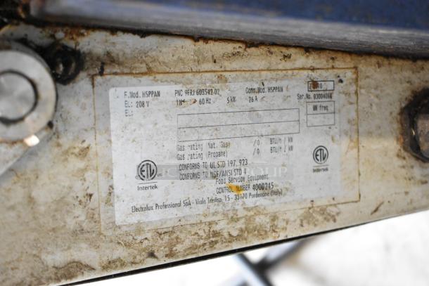 Electrolux HSPPAN Panini Press label, 208V, 1 Phase, conforms to UL STD 197, NSF/ANSI STD 4. Model and serial numbers visible.