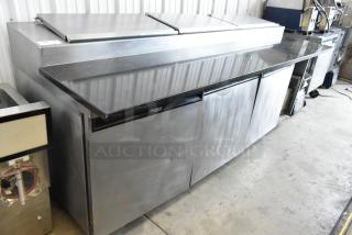 Delfield 18699PTT Stainless Steel Commercial Pizza Prep Table w/ Cutting Board on Commercial Casters. 115 Volts, 1 Phase. - Item #1200107