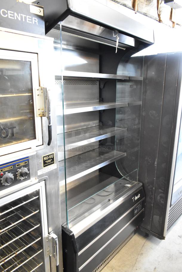 Turbo Air TOM-40B, metal open merchandiser with shelves. 120V, 1 Phase. Excellent condition. Ideal for commercial use.