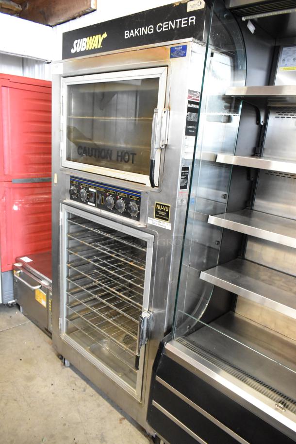 Nu Vu SUB-123 stainless steel commercial oven proofer, 208V, 3 phase, on casters. Features glass doors, control knobs, and "Caution Hot" label.