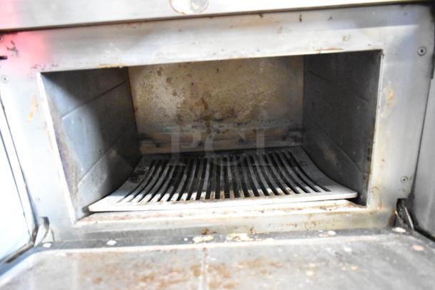 Turbochef NGC stainless steel rapid cook oven interior, showing signs of use. Electric, 208/240V, 1 phase.