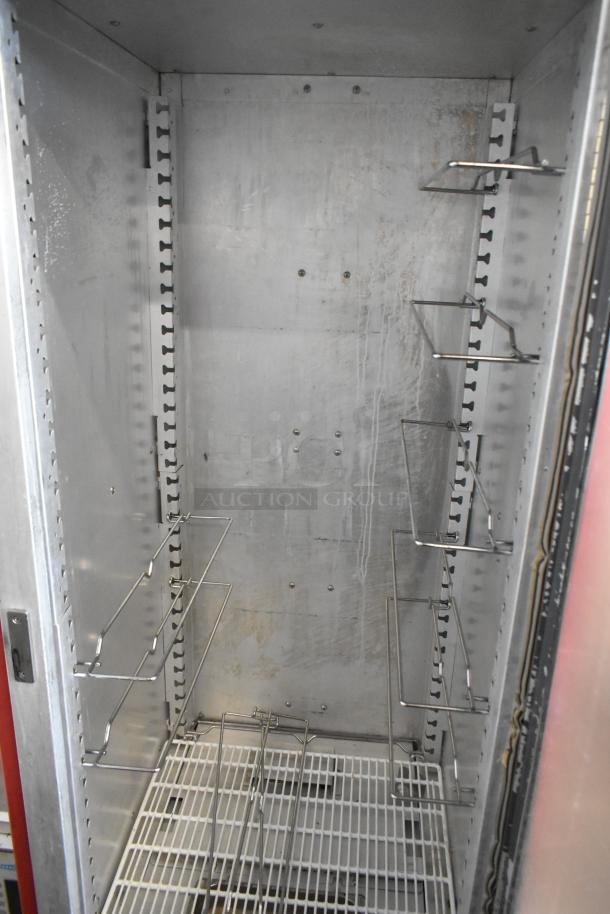 Metro C5 Metal Heated Holding Cabinet, 120V, on commercial casters, interior view with adjustable wire shelving, used condition.