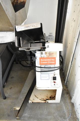 Oliver 702-N Metal Commercial Countertop Bagel Slicer, 115V, 1 Phase, visible wear, "Remember the Cream Cheese" label.