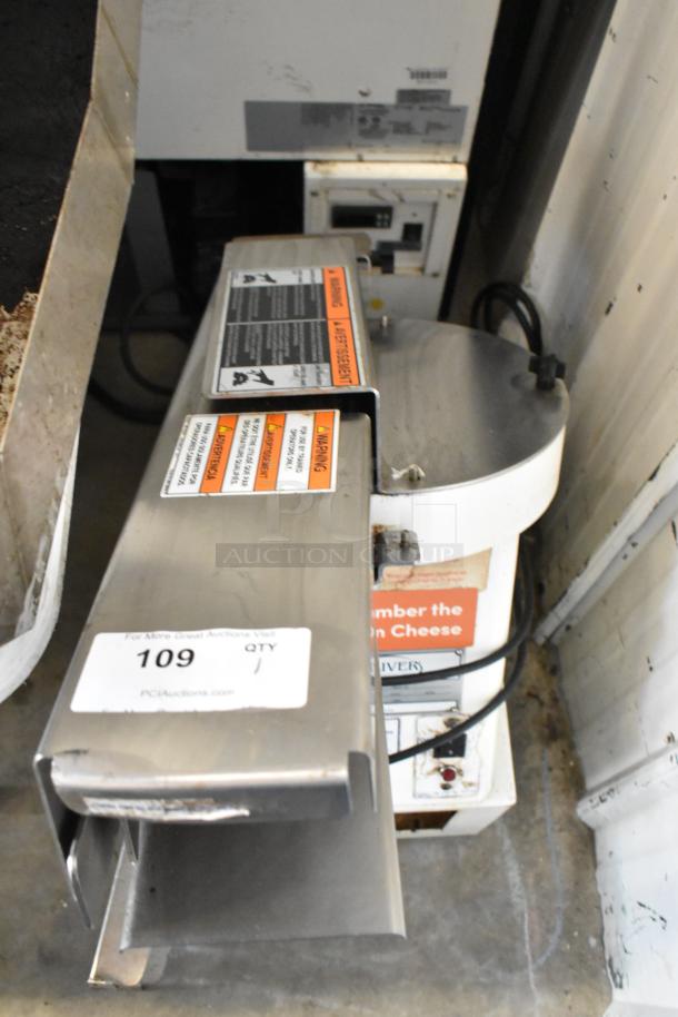 Oliver 702-N Metal Commercial Countertop Bagel Slicer, 115V, 1 Phase, visible stickers and signs of use.