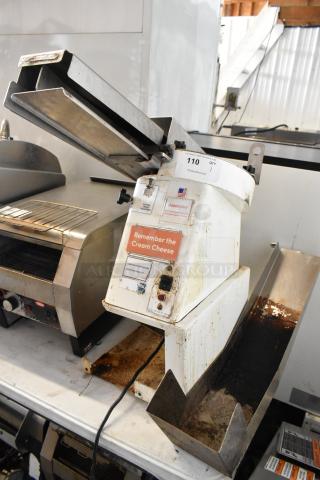 Oliver 702-N Metal Commercial Countertop Bagel Slicer, 115V, 1 Phase. Visible wear, label reads "Remember the Cream Cheese."