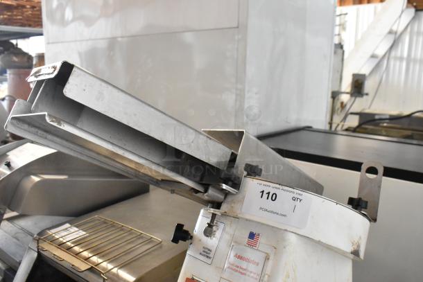 Oliver 702-N metal countertop bagel slicer in used condition. Features 115 volts, 1 phase. Includes cutting height adjustment.