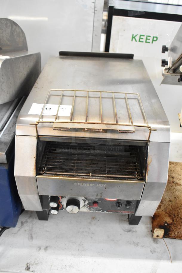 Hatco TQ-800HBA stainless steel conveyor toaster oven in used condition. Features 208V, 1 phase, countertop model.