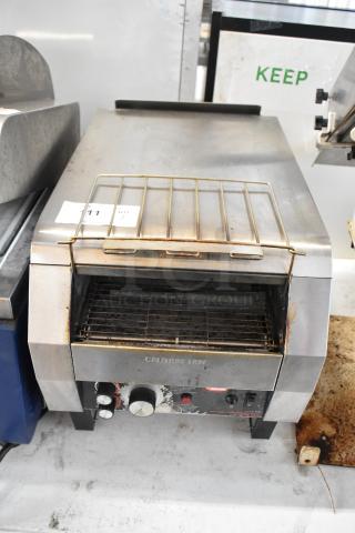 Hatco TQ-800HBA stainless steel conveyor toaster oven in used condition. Features 208V, 1 phase, countertop model.