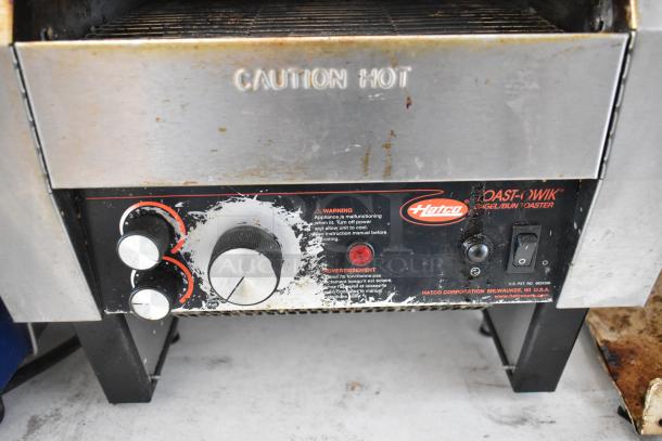 Hatco TQ-800HBA stainless steel commercial toaster oven, worn condition, 208V, 1-phase, "Caution Hot" label visible.