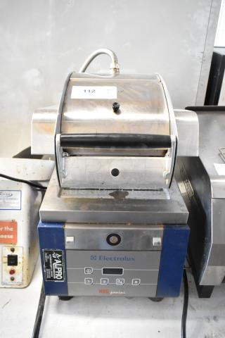 Electrolux HSPPAN metal commercial panini press, 208 volts, 1 phase. Used condition with visible controls and Alpro label.