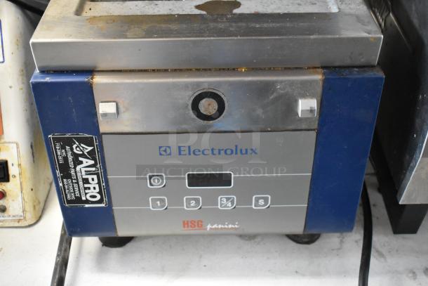 Electrolux HSPPAN metal commercial panini press, 208V, 1 phase, visible wear, Alpro service label attached.