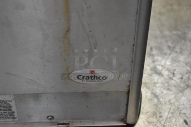 Crathco D25-3 stainless steel beverage machine base, 2 hoppers, 115V, visible logo, minor wear, commercial use.