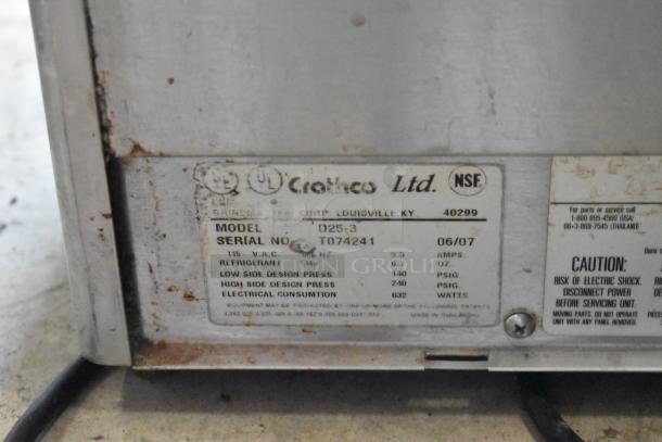 Crathco D25-3 stainless steel refrigerated beverage machine base, 2 hoppers, 115V, 1 phase. Serial: T074241. Used condition with visible wear.