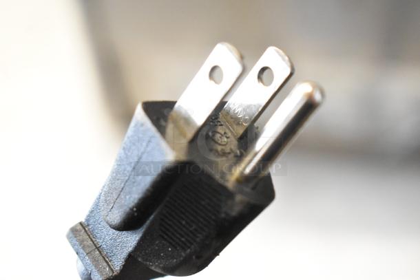 Close-up of a power plug for Valgus BBM-7L-2W Bain Marie, 120V, 1 phase, stainless steel, commercial countertop model.