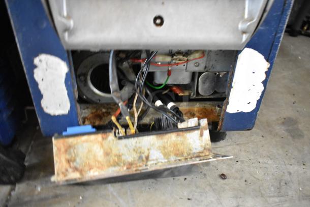 Electrolux HSPPAN metal commercial panini press. Exposed internal wiring and components; rust visible. 208 volts, 1 phase.
