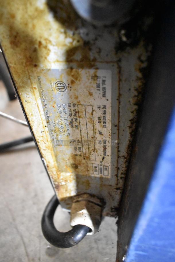 Electrolux HSPPAN commercial panini press, 208 volts, single phase, visible wear on metal exterior and label.