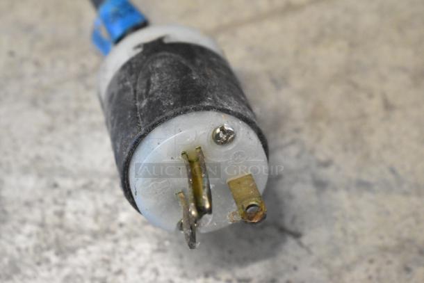 Close-up of a power plug for a Hatco TQ-800HBA Toast Qwik Conveyor Toaster Oven, showing wear and metal contacts.