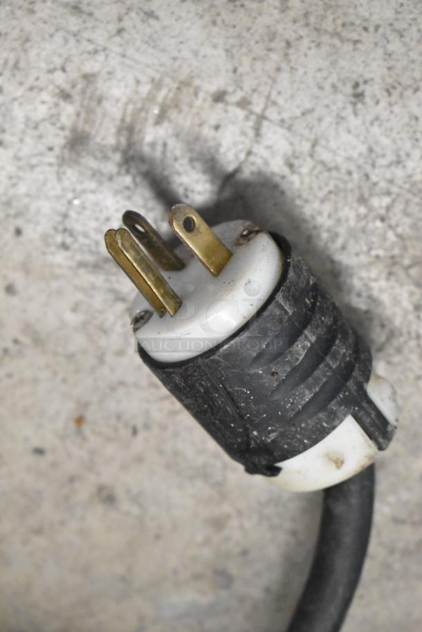 Close-up of a power plug on a Hatco TQ-800HBA Toast Qwik Conveyor Toaster, 208V, 1 Phase. Plug shows minor wear.