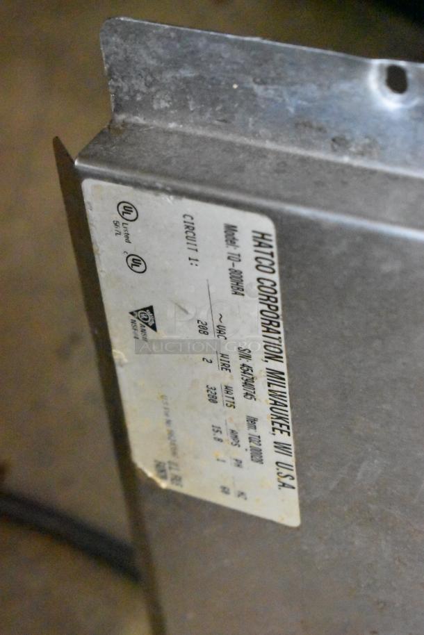 Hatco TQ-800HBA Toast Qwik Conveyor Toaster, stainless steel, 208V, 1 Phase, label shows voltage and model details.