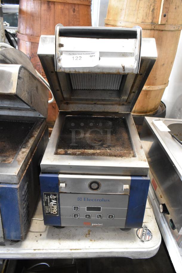 Electrolux HSPPAN metal commercial countertop panini press, 208 volts, used condition, front control panel visible.
