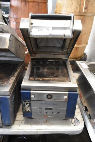 Electrolux HSPPAN metal commercial countertop panini press, 208 volts, used condition, front control panel visible.