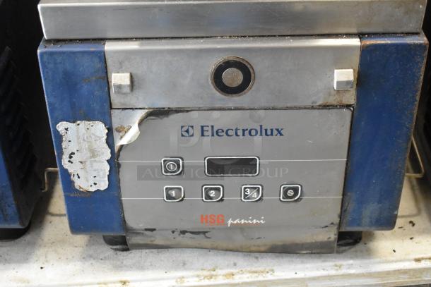 Electrolux HSPPAN commercial panini press, metal, countertop model, 208V, 1 phase, visible wear, labels and controls shown.