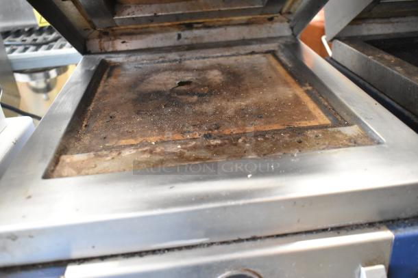 Electrolux HSPPAN metal commercial countertop panini press, 208 volts, 1 phase, showing signs of use.