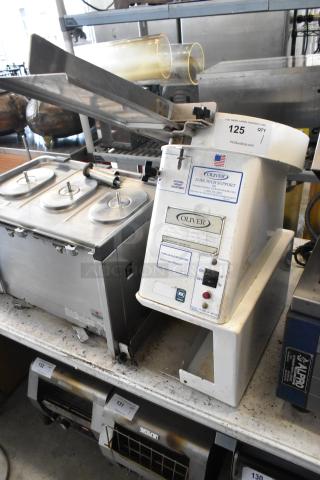 Oliver 702-N Metal Commercial Bagel Slicer, countertop model with visible control panel, 115 volts, 1 phase, used condition.