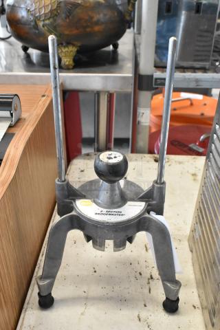 Don Metal 8 Section Wedgemaster Vegetable Cutter; sturdy metal frame, dual rods, visible label; good condition.