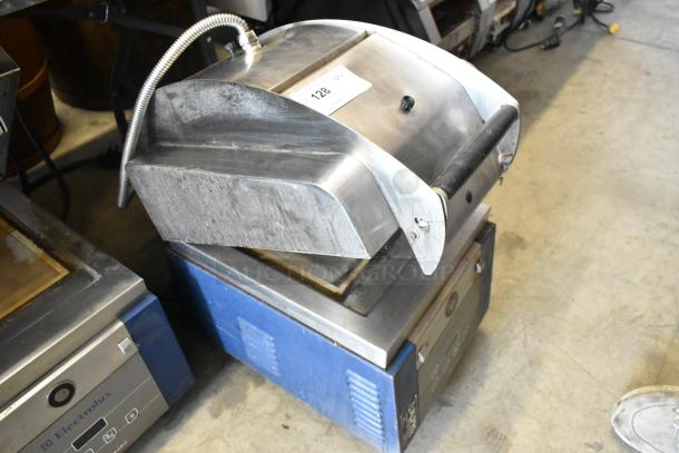 Electrolux HSPPAN metal commercial countertop panini press, 208V, 1 phase, sturdy design, slight wear on surface.