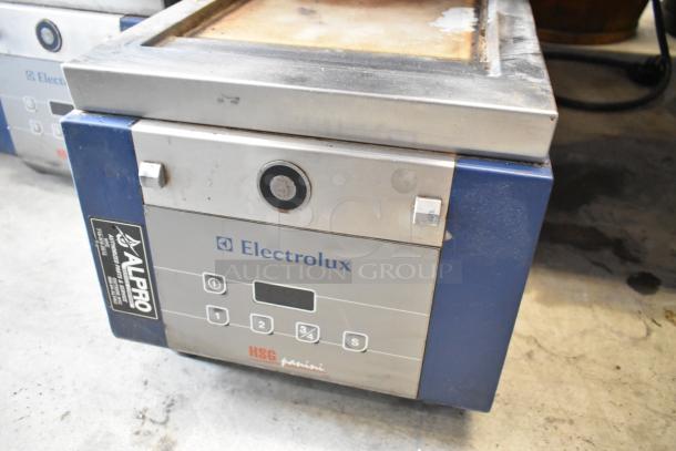 Electrolux HSPPAN metal commercial countertop panini press, 208V, 1 phase, with control panel; used condition.