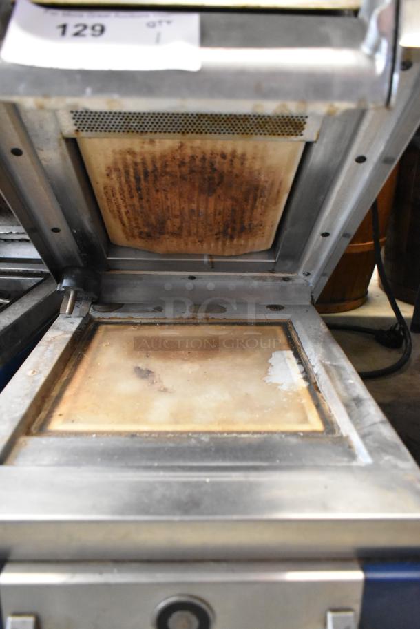 Electrolux HSPPAN metal commercial countertop panini press, open view, showing used condition. Model label visible, 208 volts, 1 phase.