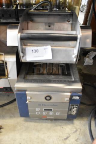 Electrolux HSPPAN metal commercial panini press, 208 volts, 1 phase, good condition, visible control panel and label.