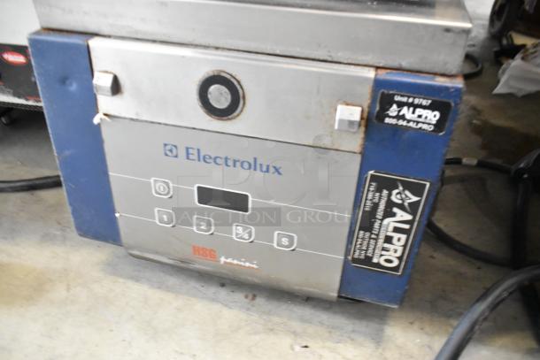 Electrolux HSPPAN commercial panini press, 208 volts, 1 phase, metal construction, visible control panel, used condition.